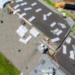 A roof replacement in progress, prompting the question, "Should I stay home during roof replacement?"