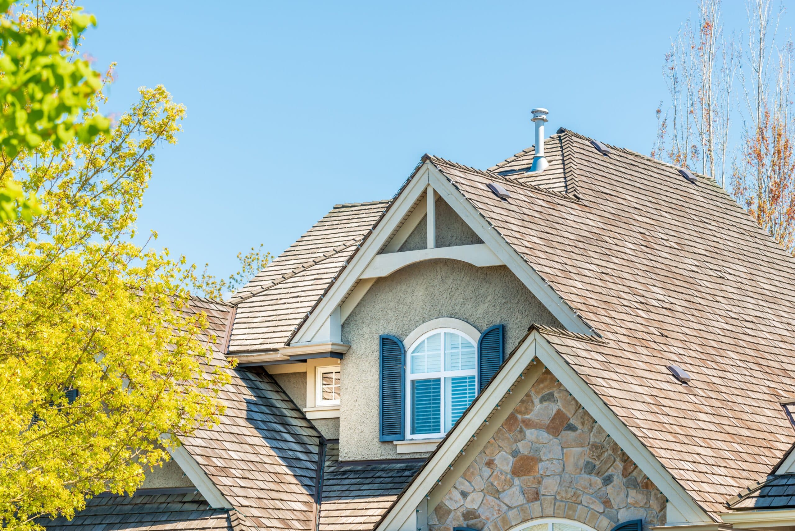 An asphalt shingle roof seen in a blog answering "How many layers of shingles should be on a roof?"