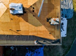 A roof replacement in progress, showing the step by step roof replacement process