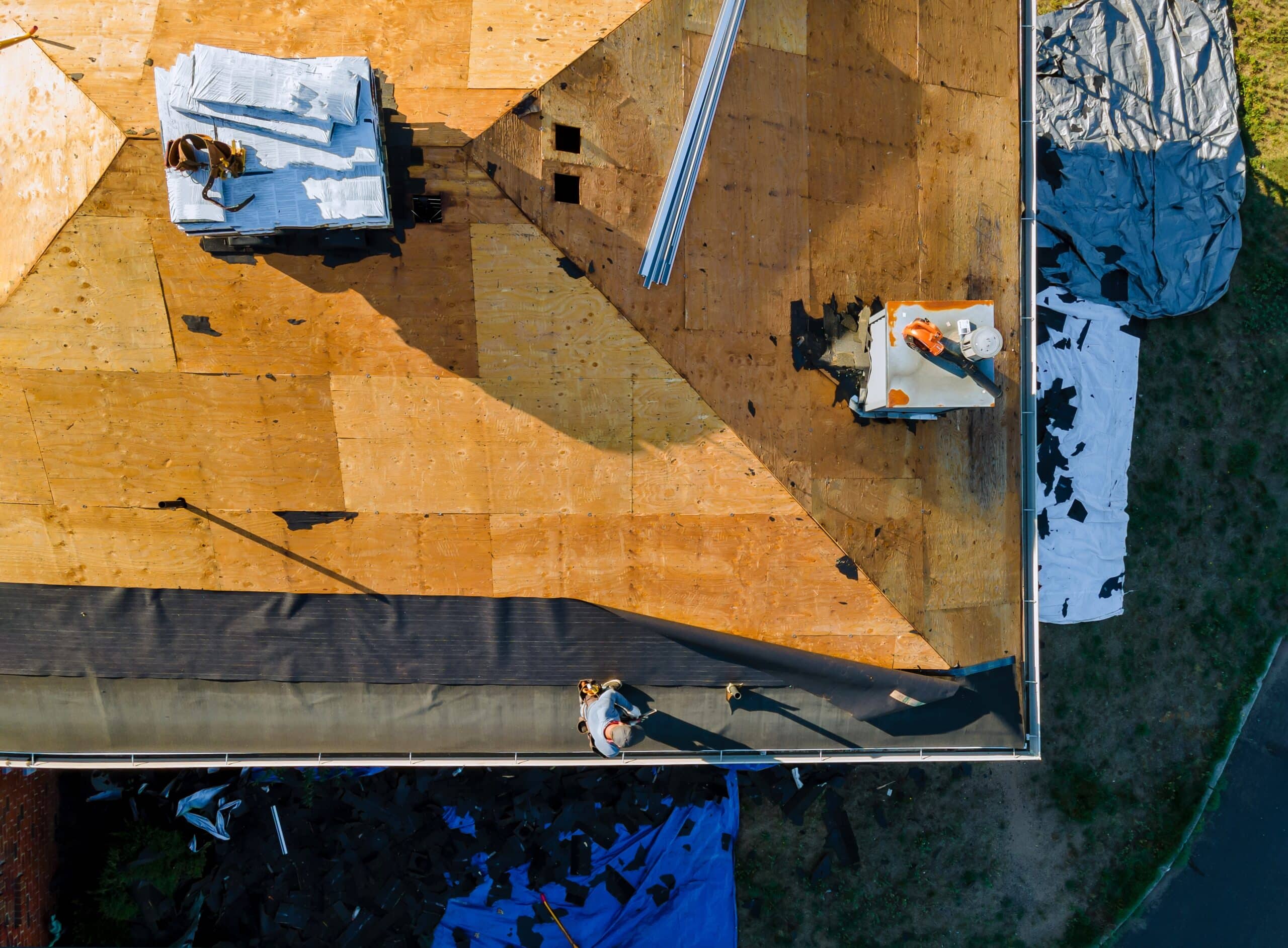 A roof replacement in progress, showing the step by step roof replacement process