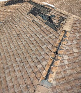 Emergency roof repair of missing shingles, one of the common types of roof repairs in Houston